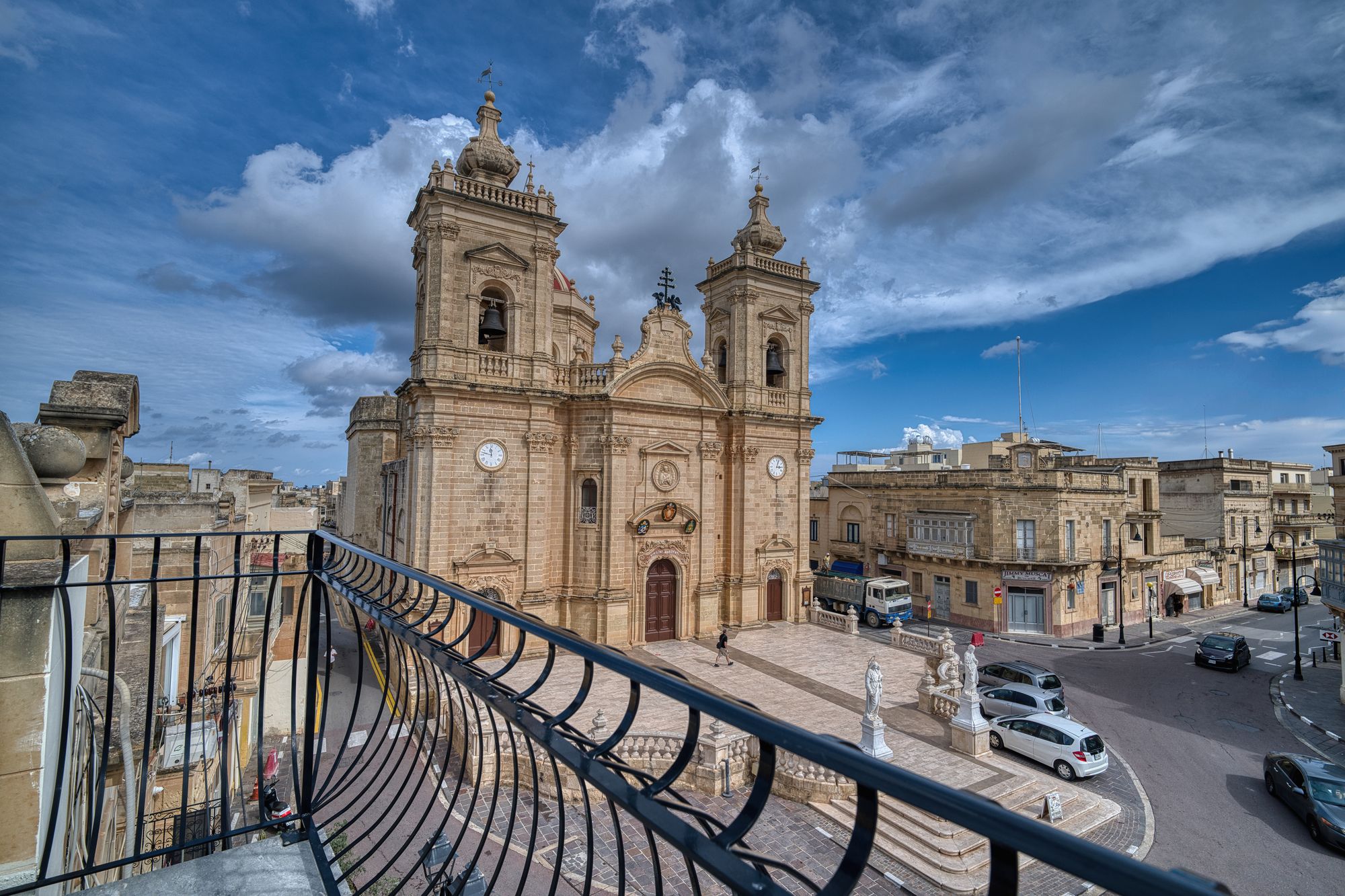 The village square and parish church of Xagħra seen from the balcony of Silver Jubilee House